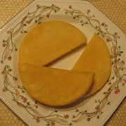 A plate displaying three pieces of Bammies, cut in half-circle shapes